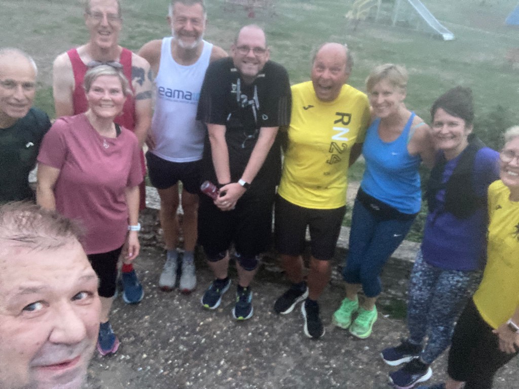 Misty morning group photo of Norfolk Run Collective runners