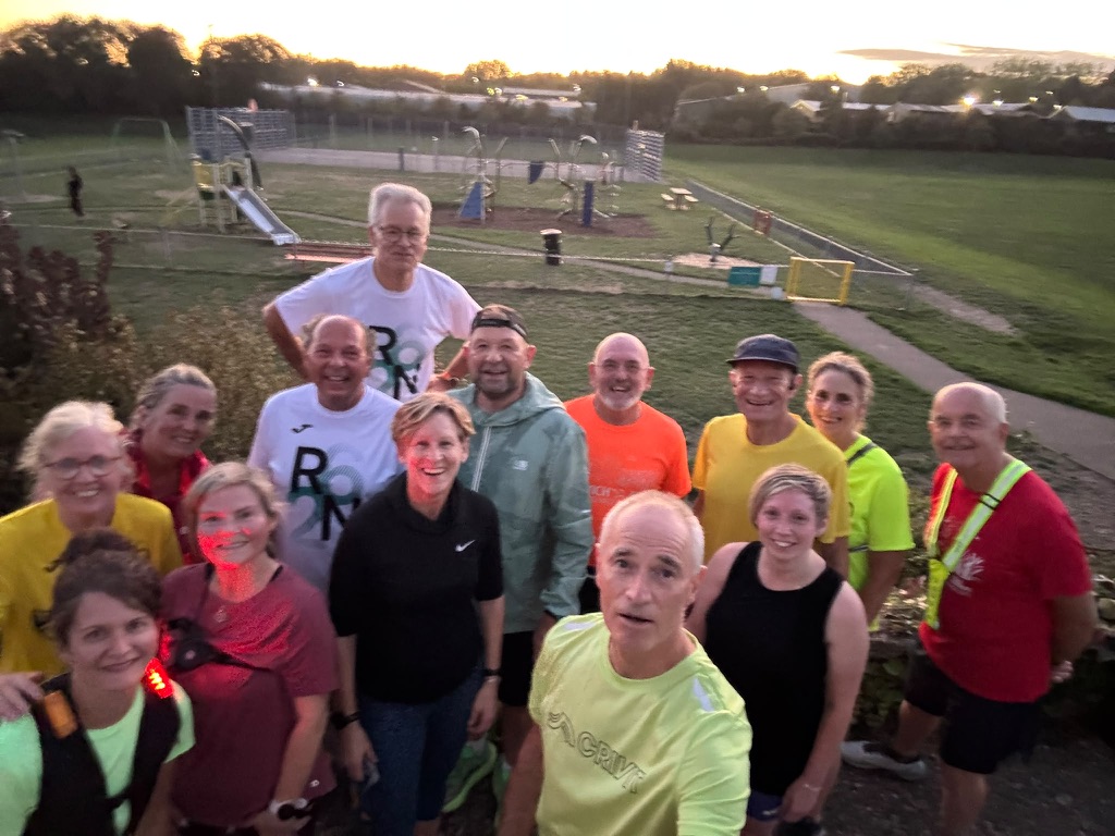 Norfolk Run Collective group after a Monday session at sunset by the playground